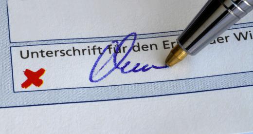 A signature's legitimacy is confirmed by a financial institution under a signature guarantee.