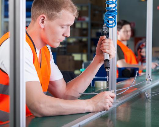 Lean manufacturing uses a mixture of human workers and machines to assemble products.