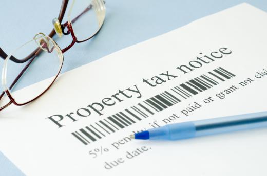 Unpaid property taxes may result in the local municipality placing a lien on a house.